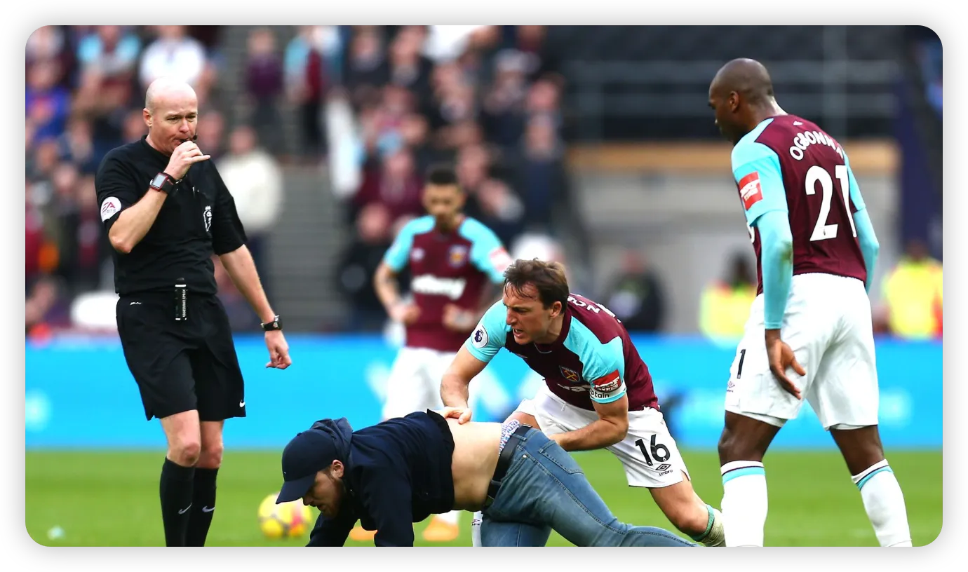 Pitch Invasions Overshadow West Ham's Heavy Defeat to Burnley